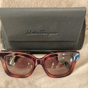 Salvatore Ferragamo Women's Brown tortoise shell and black Sunglasses.